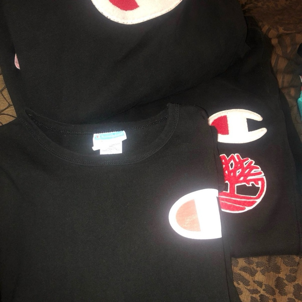 Champion track suit with matching shirt.